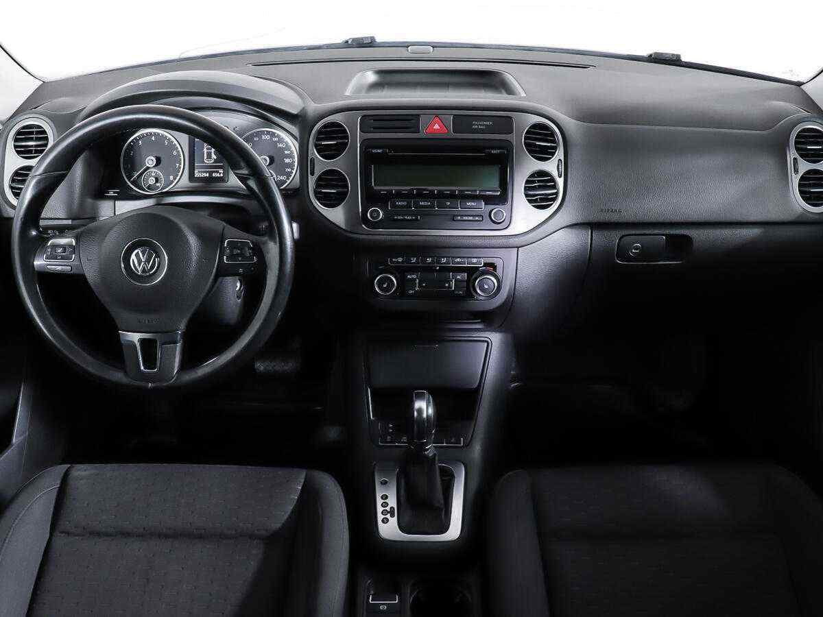 Тигуан 1 4 автомат. Тигуан 1 4 автомат. Фольксваген тигуан 1 голубой цвет. Vw tiguan 1 рестайлинг рестайлинг. В.